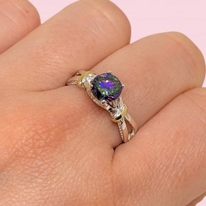 Anillo Compromiso de princesa con cubic Paraside de Plata y Oro